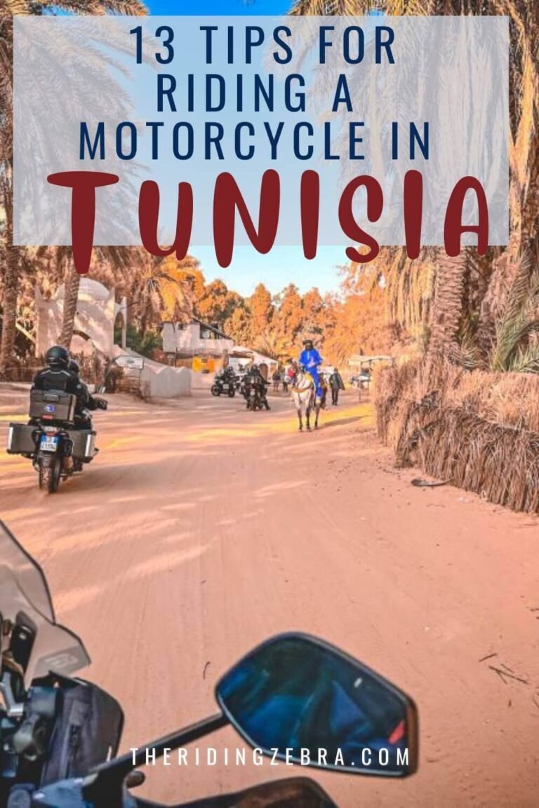 A Pinterest graphic with a desert road with motorcycles and a horse in the background and the title "13 Tips for riding a motorcycle in Tunisia"