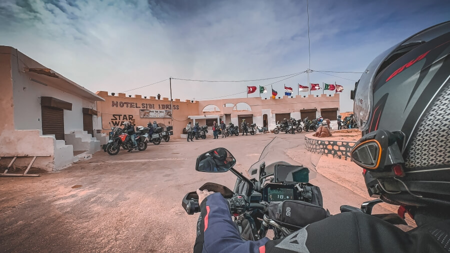 Point of view of a motorcycle arriving the entrance to a troglodyte hotel in Matmata, Tunisia