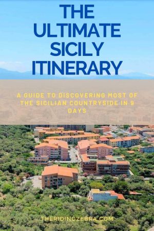 A graphic design with a cityscape in the background and the title "The Ultimate Sicily Itinerary" in the forefront